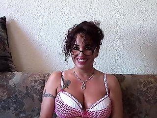 Grandma with glasses sucks some cock